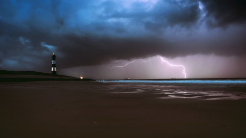 lighthouse-lightning-sea-ocean-beach-weather-5k-ef-5120x2880.jpg
